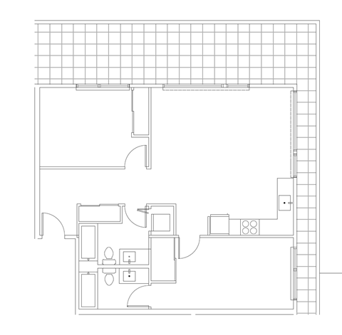 A floor plan of a house with a kitchen, living room, and bathroom.